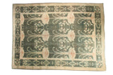 Vintage Indo Donegal carpet with Arts and Crafts floral pattern in burnt teal and pale blush.