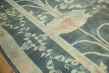 Arts and Crafts inspired stylized bird and floral motif on vintage Indo Donegal rug.