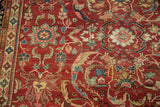 Antique Persian Mahal rug detail: cherry red field, Islimis lotus vinery, visible wear.
