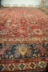 Antique Mahal rug's navy border and cherry red field featuring intricate Islimis vinery.