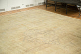 Vintage distressed Kaisary carpet showing subtle tone-on-tone patterns and textured, etched wear.