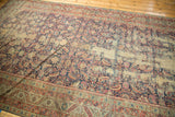 Patina and exposed foundation revealing Herati mahi motifs on an antique Karabagh rug.