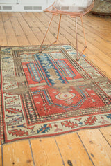Antique Caucasian prayer rug with stick human figures and professional rewoven areas.