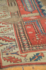 Intricate human figure and geometric patterns on an antique Caucasian prayer rug.