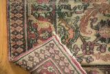Hand-knotted foundation and secured border edge of an Antique Distressed Khorassan Carpet.
