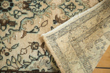 Hand-knotted foundation and patterned pile of a vintage Hamadan rug with floral motifs.