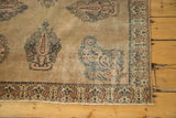 Antique Doroksh rug corner: intricate paisley motifs, mini boteh border, antique ivory, navy, peach tones.