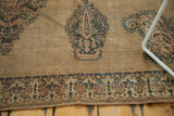 Antique Doroksh rug's worn border showing intricate mini boteh and Mil Fleur style floral design.