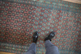 Repeating boteh motif on Serbend runner, shifting from dusty raspberry red to aqua blue.