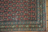 Vintage Serbend runner corner, dusty raspberry boteh field, aqua-bronze border, visible pile texture.