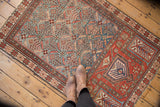 Antique Caucasian prayer rug, geometric lattice with serrated leaves and red mihrab in blue and madder.