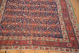 Antique Afshar rug corner, showcasing serrated leaf design and border with boteh and pomegranate motifs.