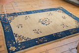 Art Deco Peking carpet border with delicate floral vinery and indigo blue.