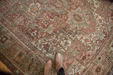 Decorative vintage Karaja carpet showcasing rectilinear pattern, distressed texture, and blended bronze-slate colors.