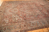 Distressed vintage Karaja rug corner, bronze and slate geometric border detail.