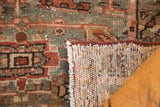 Distressed hand-knotted texture and foundation of a vintage Persian Karaja rug.