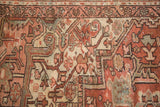 Distressed vintage Karaja carpet detail with even wear, rectilinear patterns, and bronze, beige, copper tones.