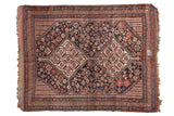 Antique Kamseh rug: double medallions, dense navy field with brick red, gold geometric motifs, 4'10