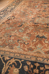 Antique Mahal carpet detail shows bold curvilinear allover pattern in chocolate bronze and navy.