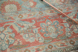 Distressed Mahal rug pile showing even wear, foundation, and red, blue, beige florals.