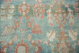 Distressed Mahal carpet pile, even wear and foundation through cinnabar red florals.