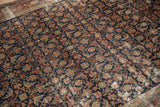 Distressed antique Malayer carpet, showcasing Herati Mahi motif in indigo, red, and ivory.