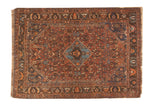 Antique Qashqai rug, sky blue diamond medallion, madder red Herati-patterned field, 4'11