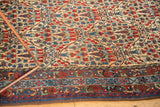 Close-up of vintage Bijar rug's cypress tree trellis motif in madder red, blue, and intricate border.