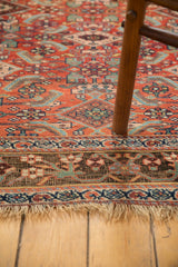 Fringe and detailed border of antique Kurdish Bijar rug, with etched madder red pile.