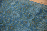 Overdyed slate blue vintage Hamadan runner pile with distressed palmette and leaf motifs.