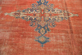 Antique Mahal rug medallion with worn madder root red field and sky blue motifs.
