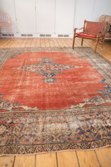 Hand-knotted antique Mahal carpet corner detail, showing madder root red and faded purple patterns.