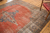 Mahal carpet border in sky blue and antique ivory, with madder root red field showing even wear.