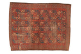 Vintage Afghan hand-knotted carpet, allover madder red and blue guls, apricot accents, visible wear.