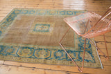 Distressed texture and faint foundation of vintage Agra border with sky blue serrated leaf.