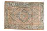 Vintage Distressed Heriz carpet with intricate geometric medallion, powder blue, camel, and ivory colors. 6'8