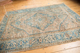 Geometric patterns with distressed knot heads in powder blue and pale camel tones.