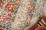 Antique distressed Mahal carpet detail: madder red, blue roundel palmettes, low pile.