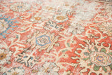 Distressed antique Mahal carpet with low pile, madder red, and faded floral palmettes.