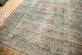 Vintage Distressed Mahal carpet corner with faded green, blush roundel motifs and visible wear.
