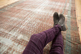 Distressed antique Malayer runner, mir boteh pattern, terra cotta, white, and visible foundation.