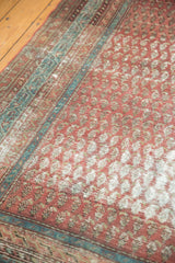 Distressed texture and faded mir boteh pattern on antique Malayer runner with exposed foundation.