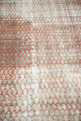 Distressed antique Malayer runner texture, revealing faded mir boteh and worn knot heads.