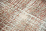 Distressed antique Malayer runner showing worn pile, visible foundation, and restrung area.