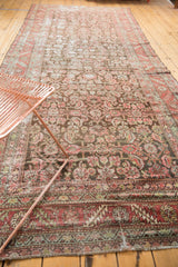Worn antique Karabagh rug border, with exposed foundation and wine red serrated leaf motif.