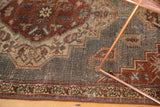 Vintage Distressed Northwest Persian rug, showing geometric floral botehs and soft patina.