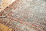Distressed Mahal runner detail with faded Herati palmettes, ivory, blue, and blush over exposed foundation.