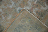 Vintage distressed Agra carpet shows worn foundation, woven backing, and secured edge.