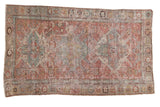Antique Distressed Caucasian Soumac rug, triple eagle medallion and geometric field in blush red, slate blue.