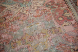 Textured pile of distressed antique Caucasian Soumac rug with muted blush red and pale gold.